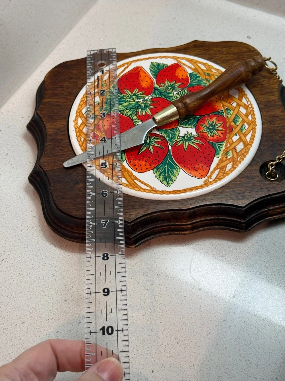 Vintage cheese board with matching knife.